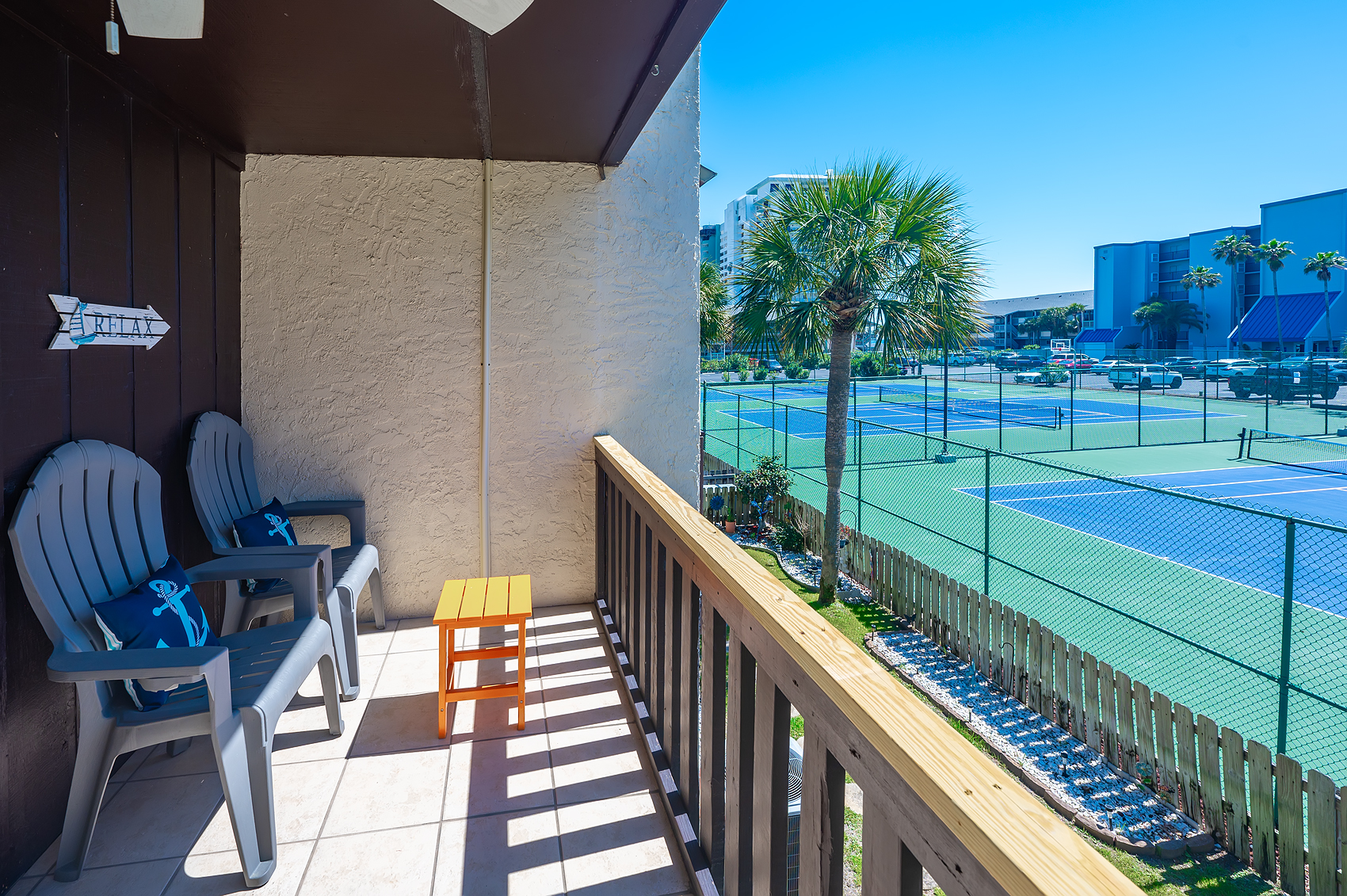 Upper deck balcony overlooking pickleball courts