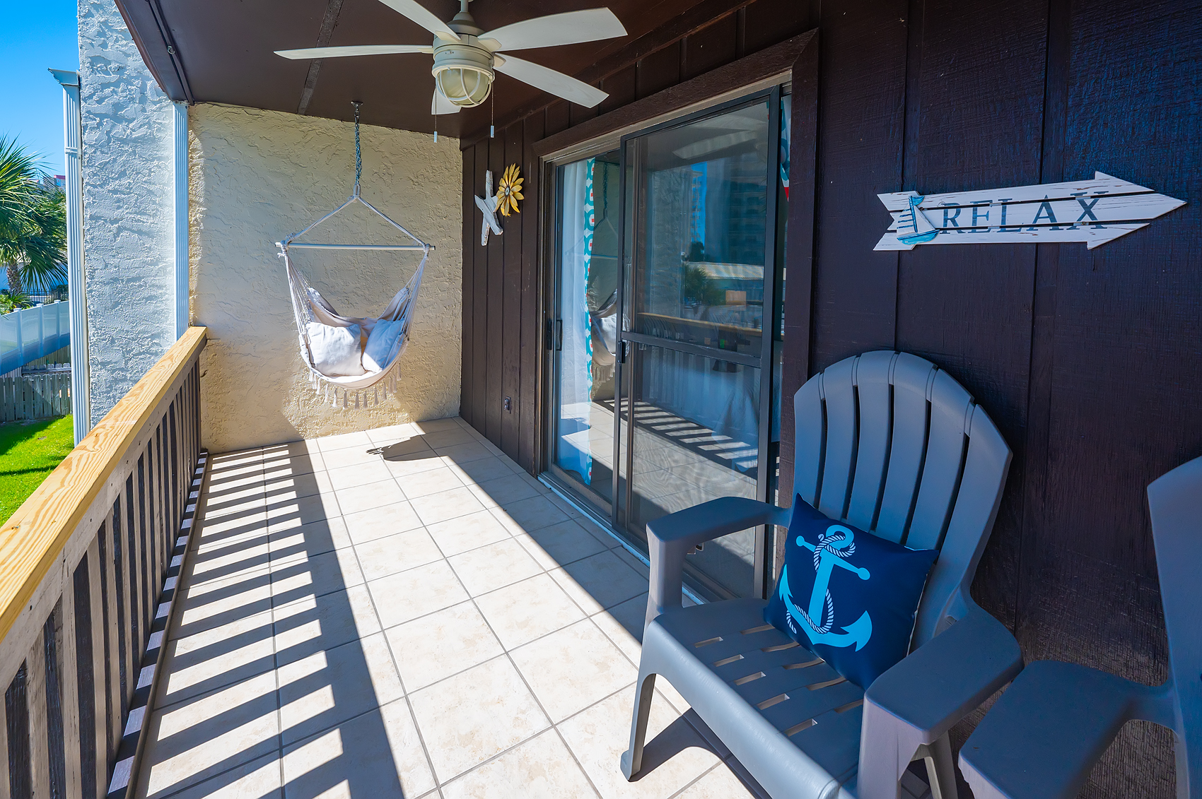 Upper deck with hammock chair and RELAX sign